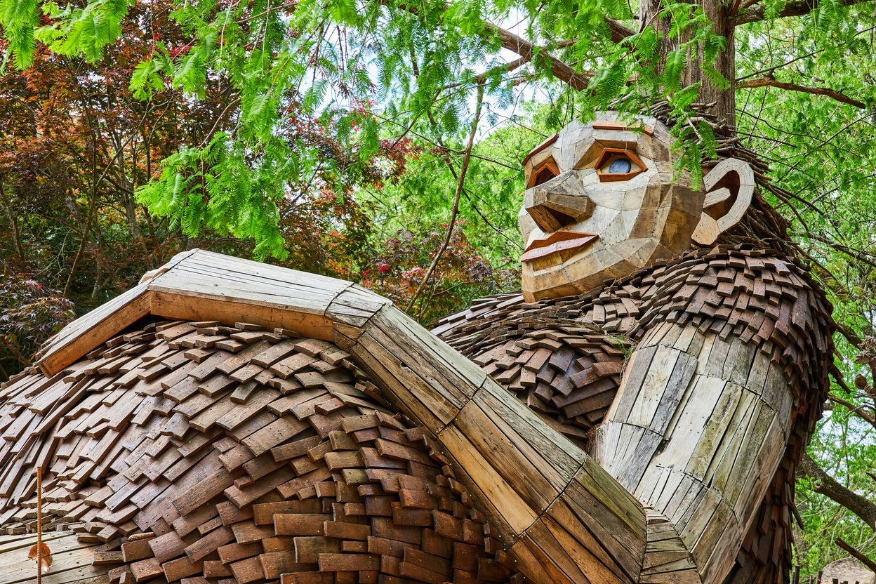 Wooden Troll Sculpture in the Forest